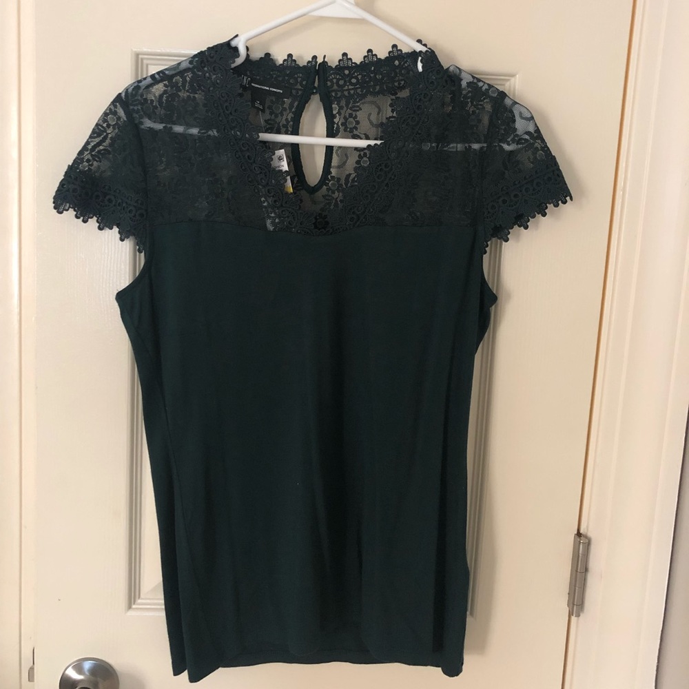 V-neck lace detailed top in deep emerald.